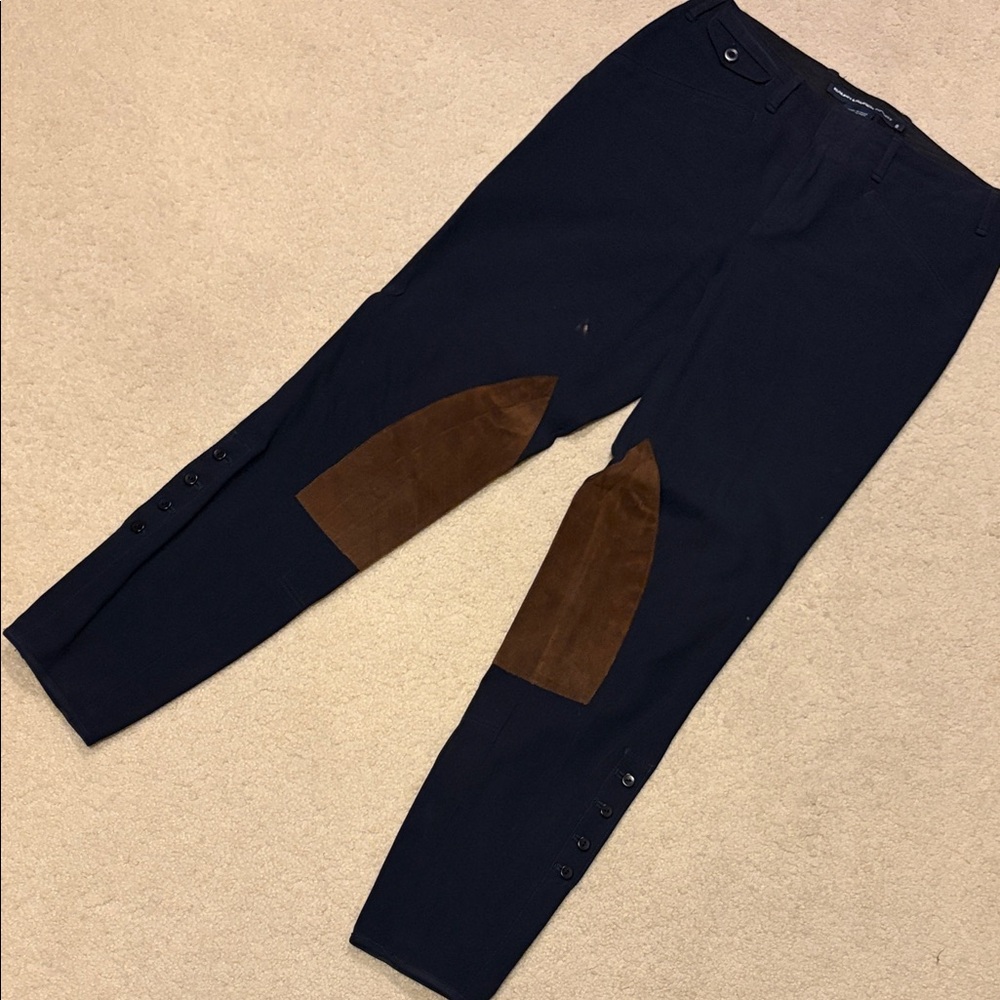 Women riding navy and Brown Pants